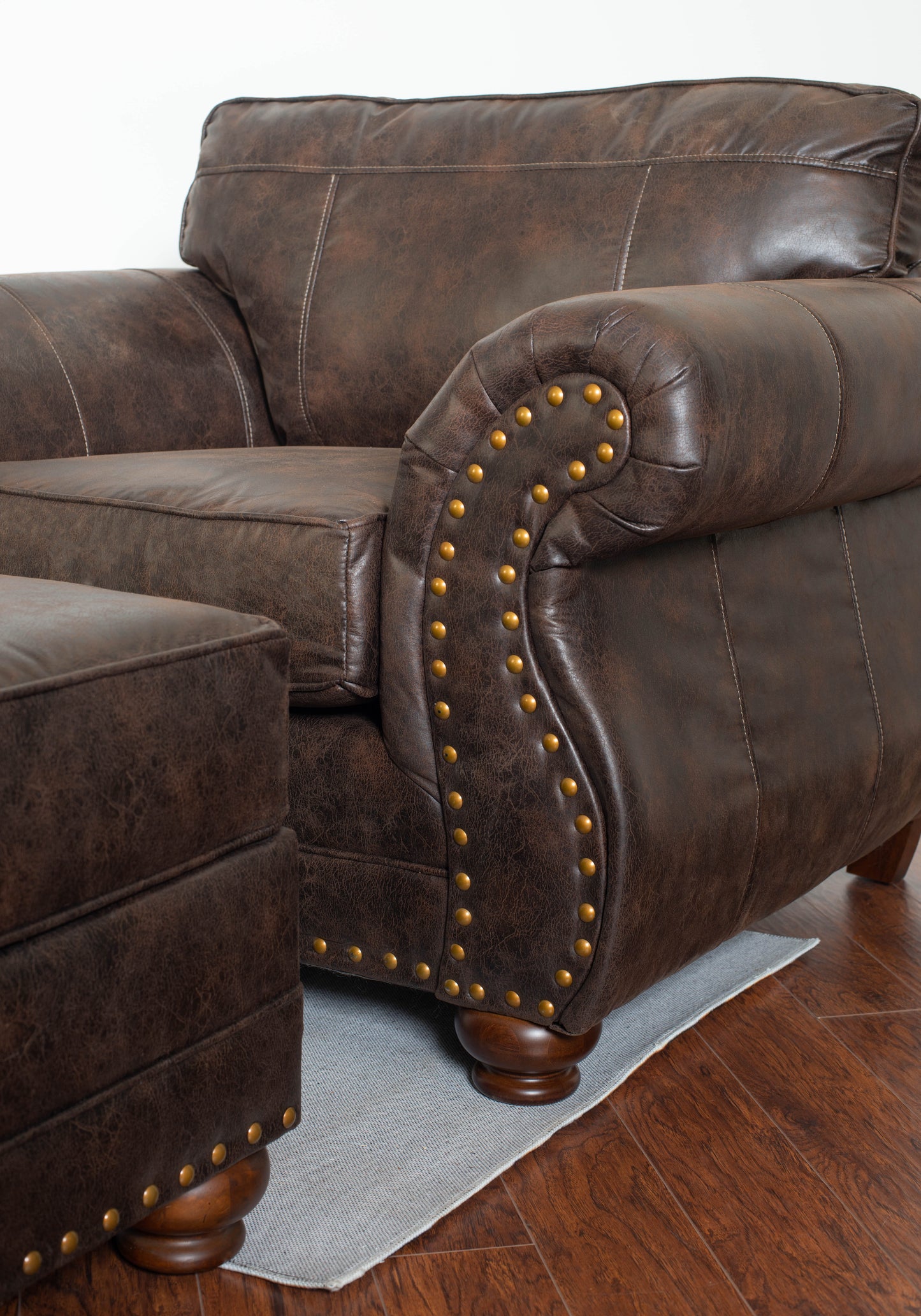 Leinster Faux Leather Upholstered Nailhead Chair and Ottoman in Espresso